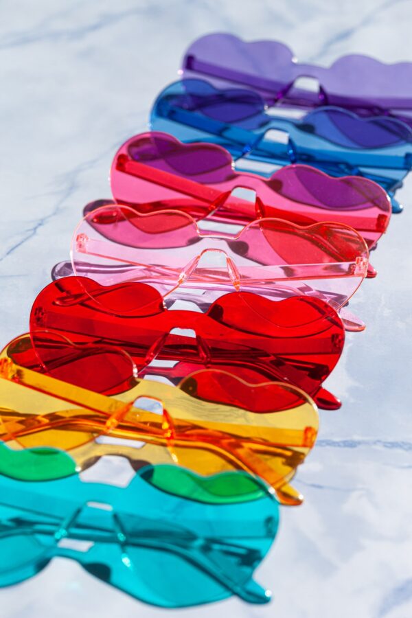 Colorful sunglasses in heart shapes