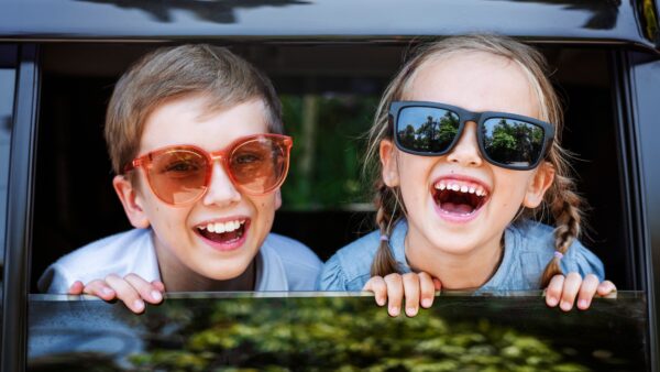 Cute kids with big sunglasses and big smiles